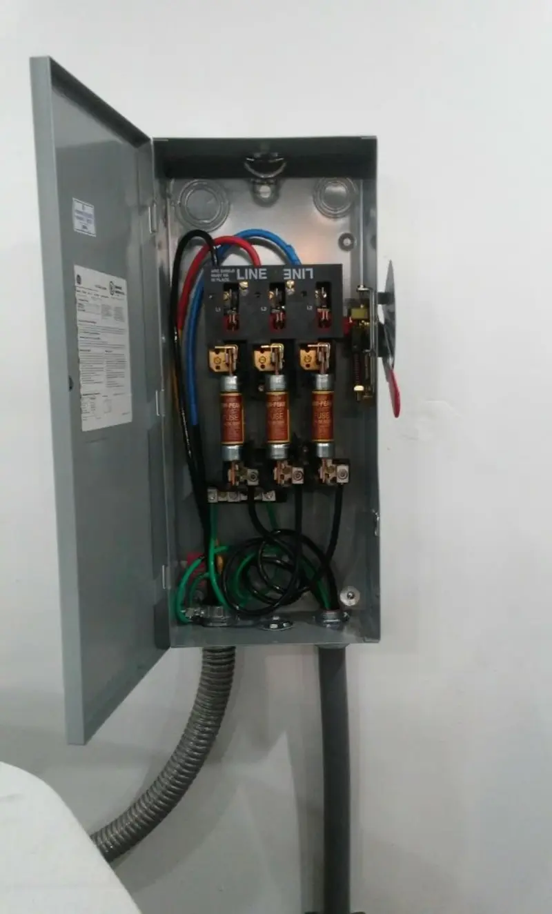 Three-phase disconnect switch installed for Smoke Detector Installation in Surf City